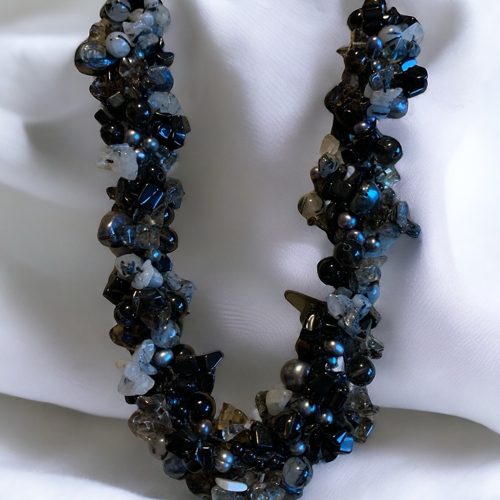 Gorgeous multi strand necklace with Tahitian pearls, gemstones and crystals.